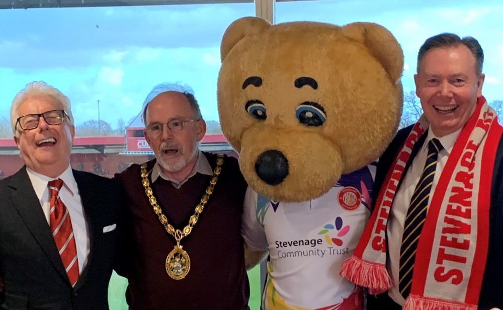 Ken Follett, Simon Speller and Rob Steward with Boro Bear